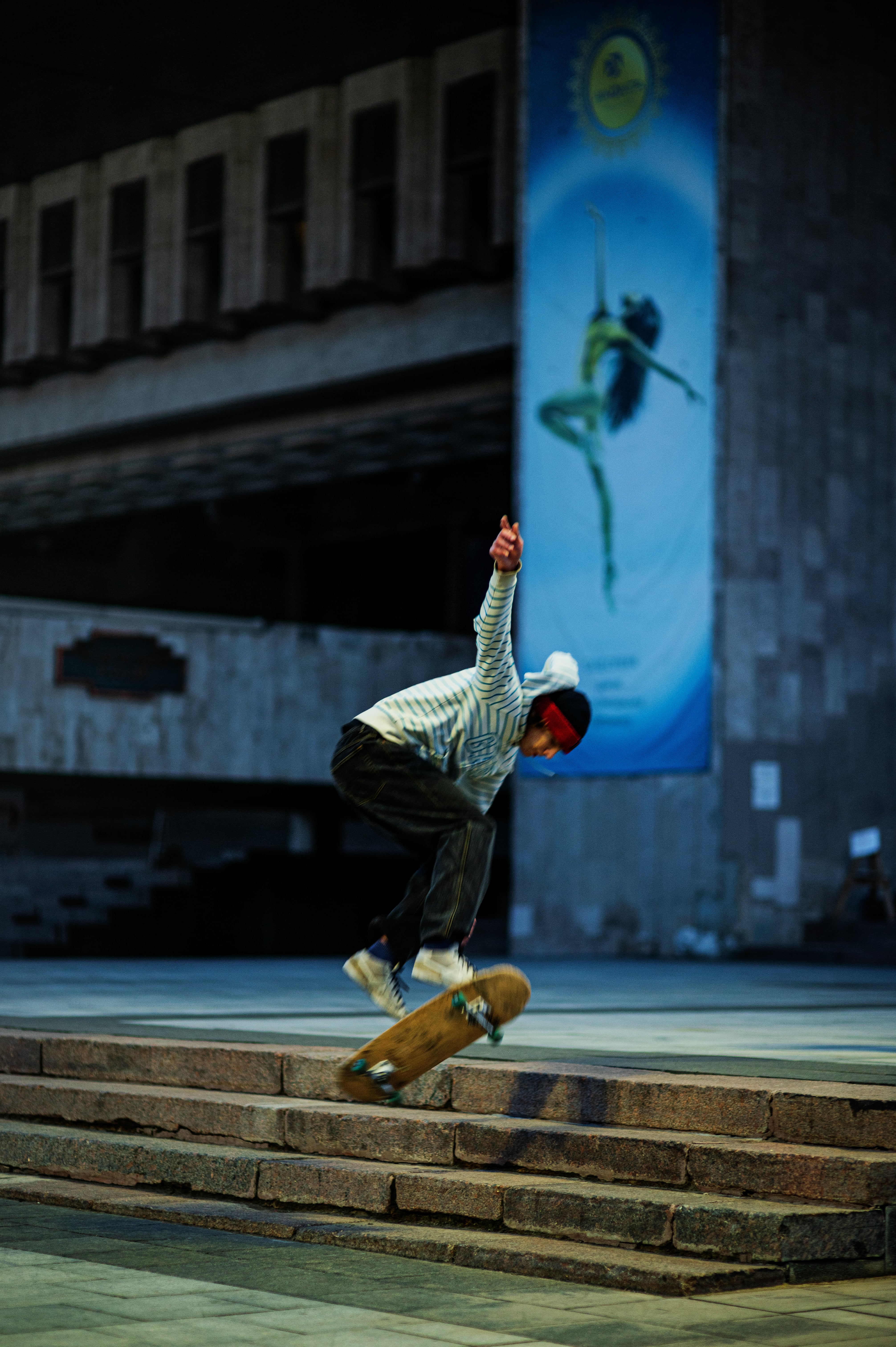 A skateboarder in front of the Kharkiv National Academic Opera and Ballet Theatre. ©Denis Vėjas