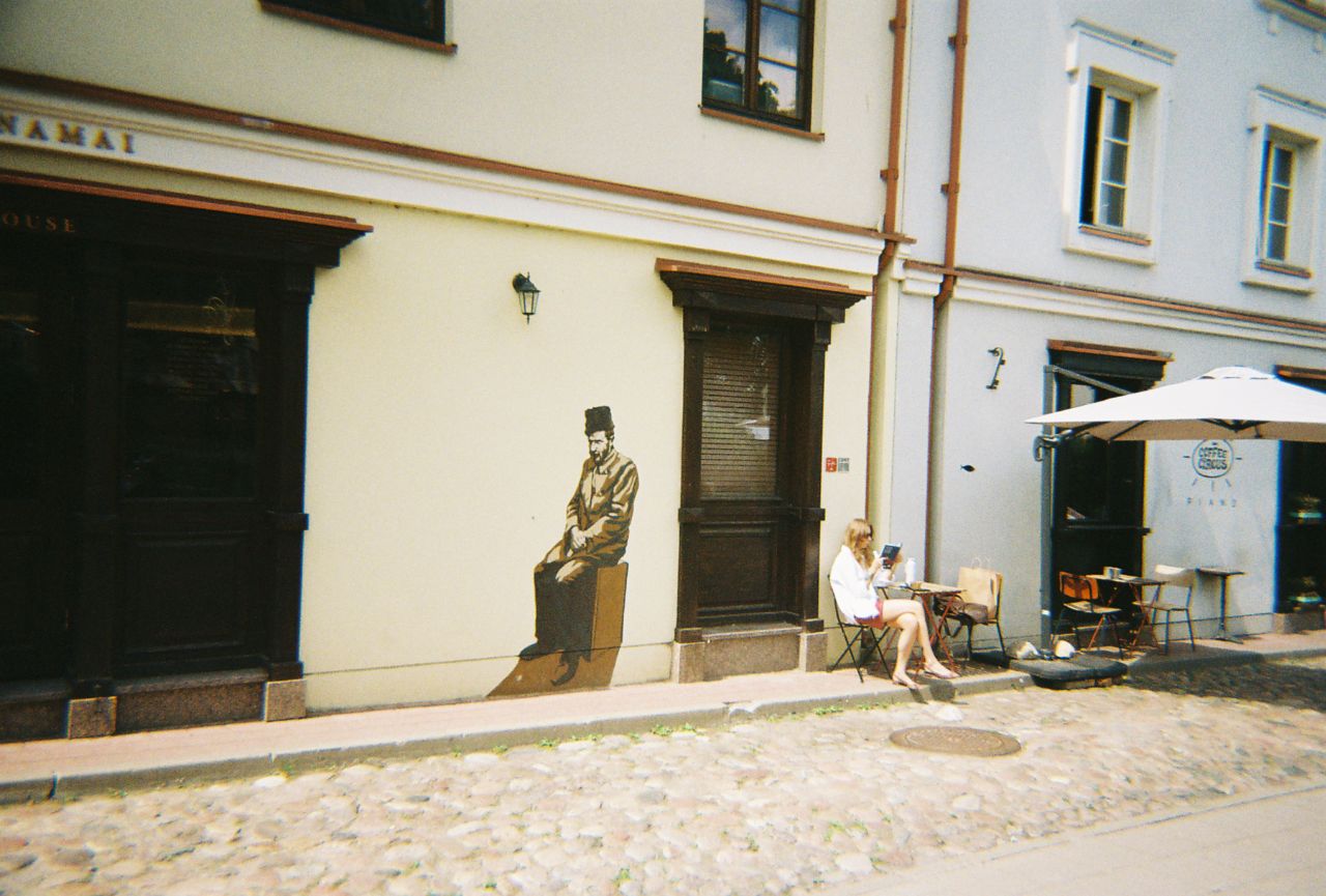 Murals of the Jewish people painted by Lina Šlipavičiūtė-Černiauskienė, taken on Mėsiniu g. and Šv. Mikalojaus g. respectively. They portray Jewish life in Vilnius before the Second World War, and are based on photographs of real people. ©Polina Tolpygina