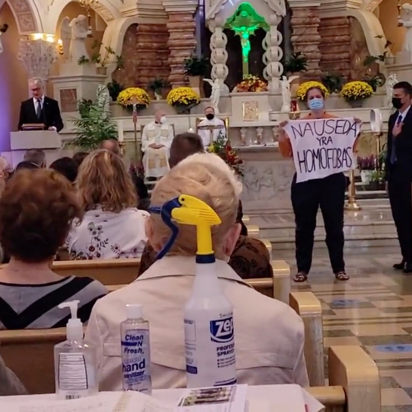 Eglė during the protest this September with the Lithuanian president Gitanas Nausėda in the back giving a speech. ©Cadno