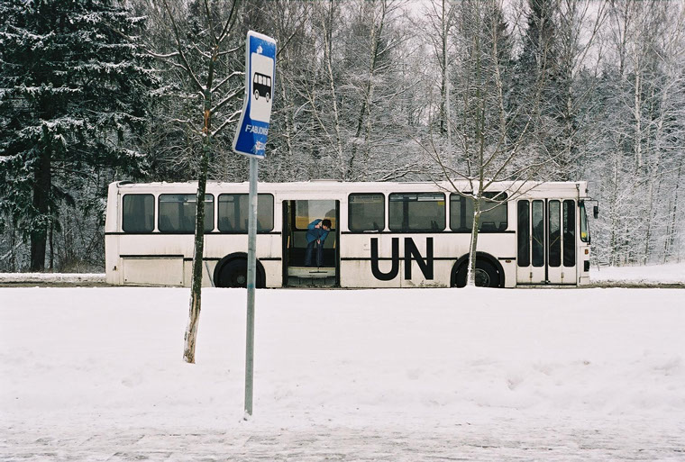 Public buses in Vilnius painted white with the UN letters simulated the UN peacekeeping mission aesthetics. ©Edwin Zwakman