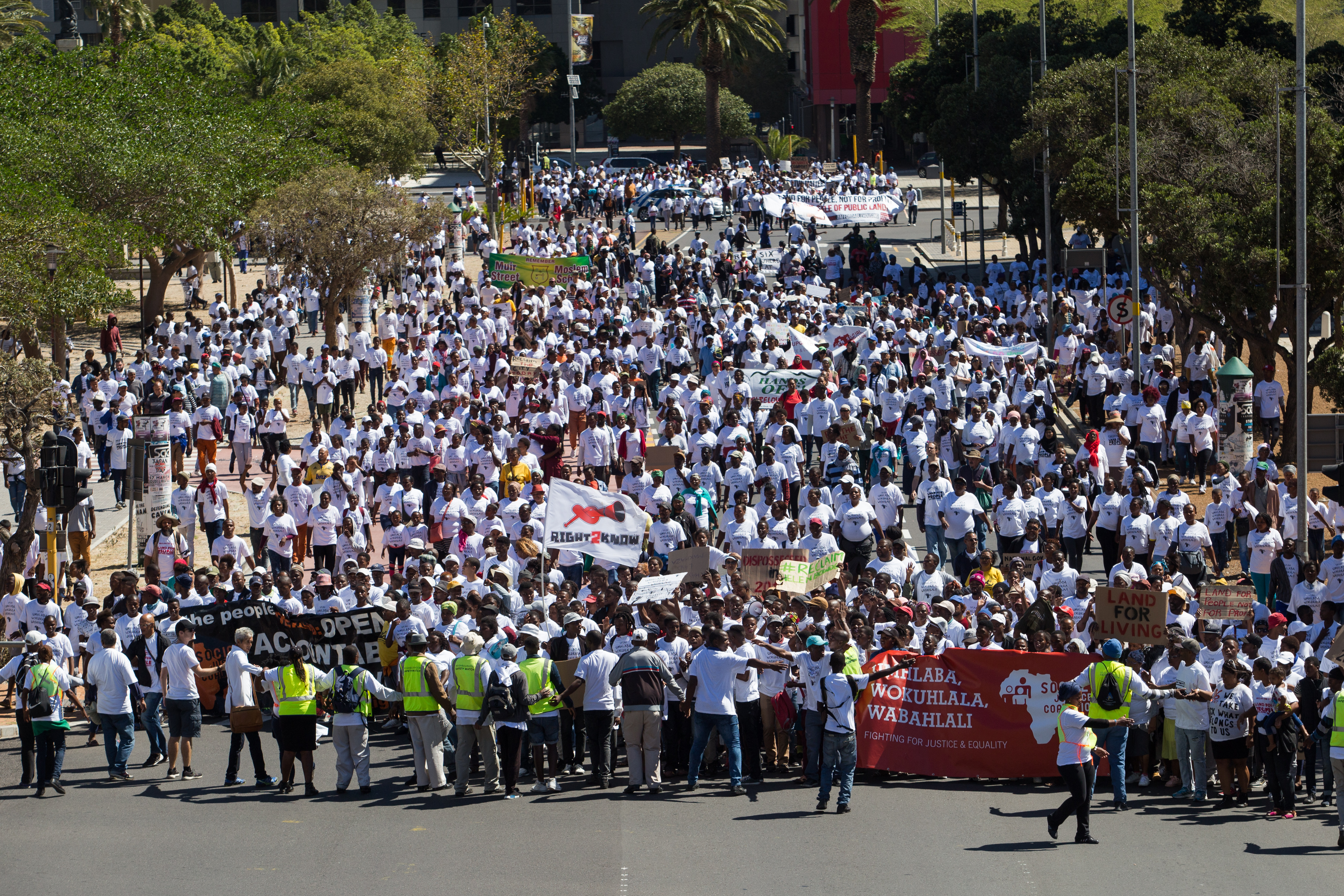 Thousands marched towards the Cape Town Civic Centre on Human Rights Day 2018 to demand land for better housing. ©Ashraf Hendricks / GroundUp