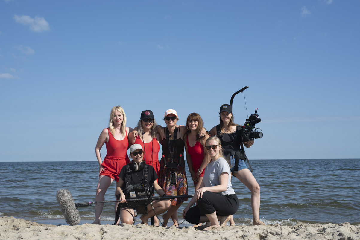 'It was our first film, we were first-time filmmakers, and we didn't know anything. The only thing we knew was that we knew how to tell stories because we were both journalists,' says Karolina (in the middle), pictured together with the film's team. ©Karolina Jackowska