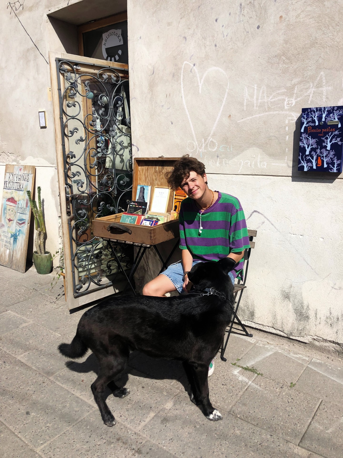 Author in Užupis with his dog Džiugas. Summer 2019. ©Author’s personal archive