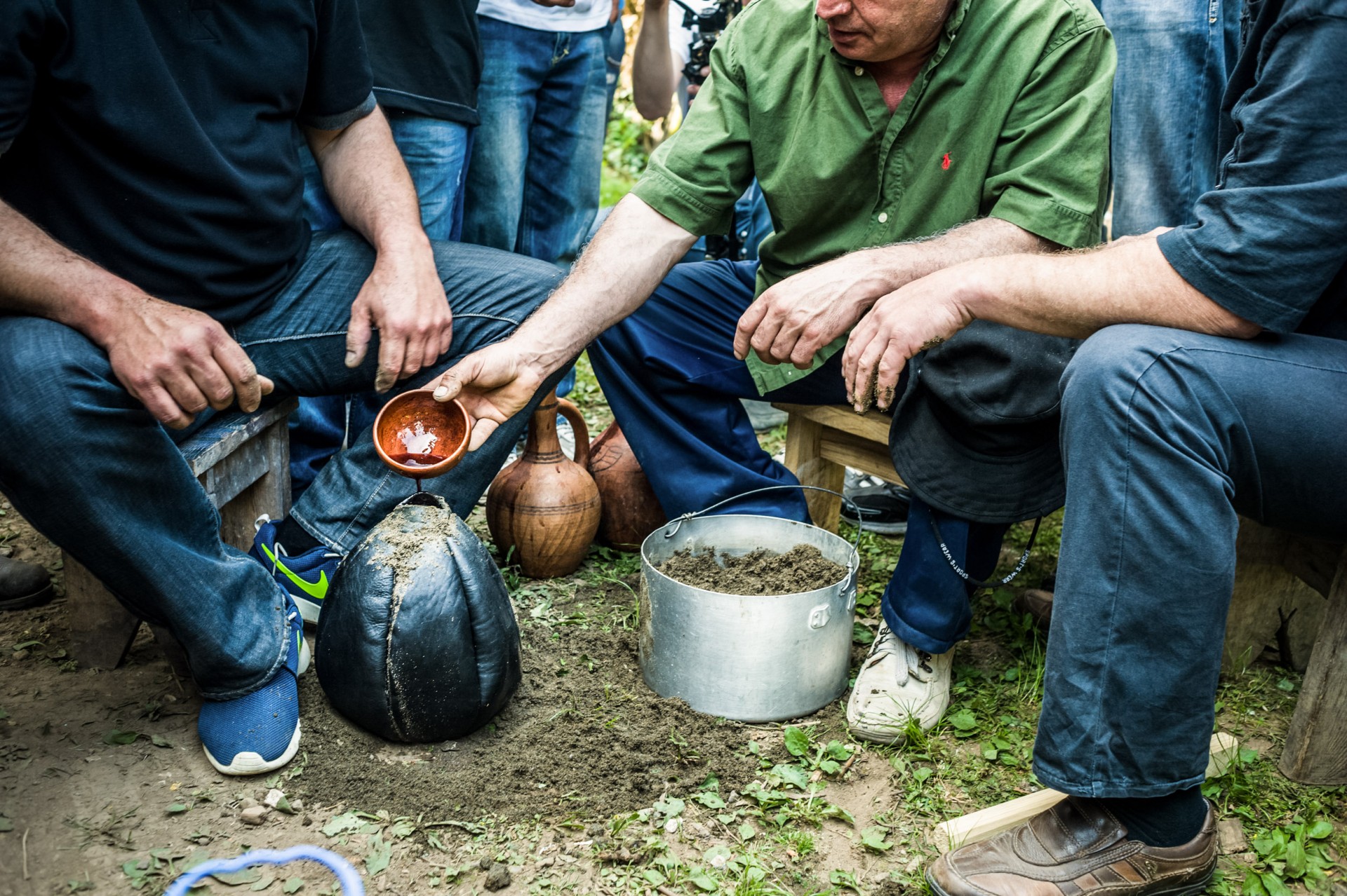 The ceremony of stuffing the ball reminds the times before Christianity. Together with the soil, there is also honey, pomegranate, and wine added to the vessel.