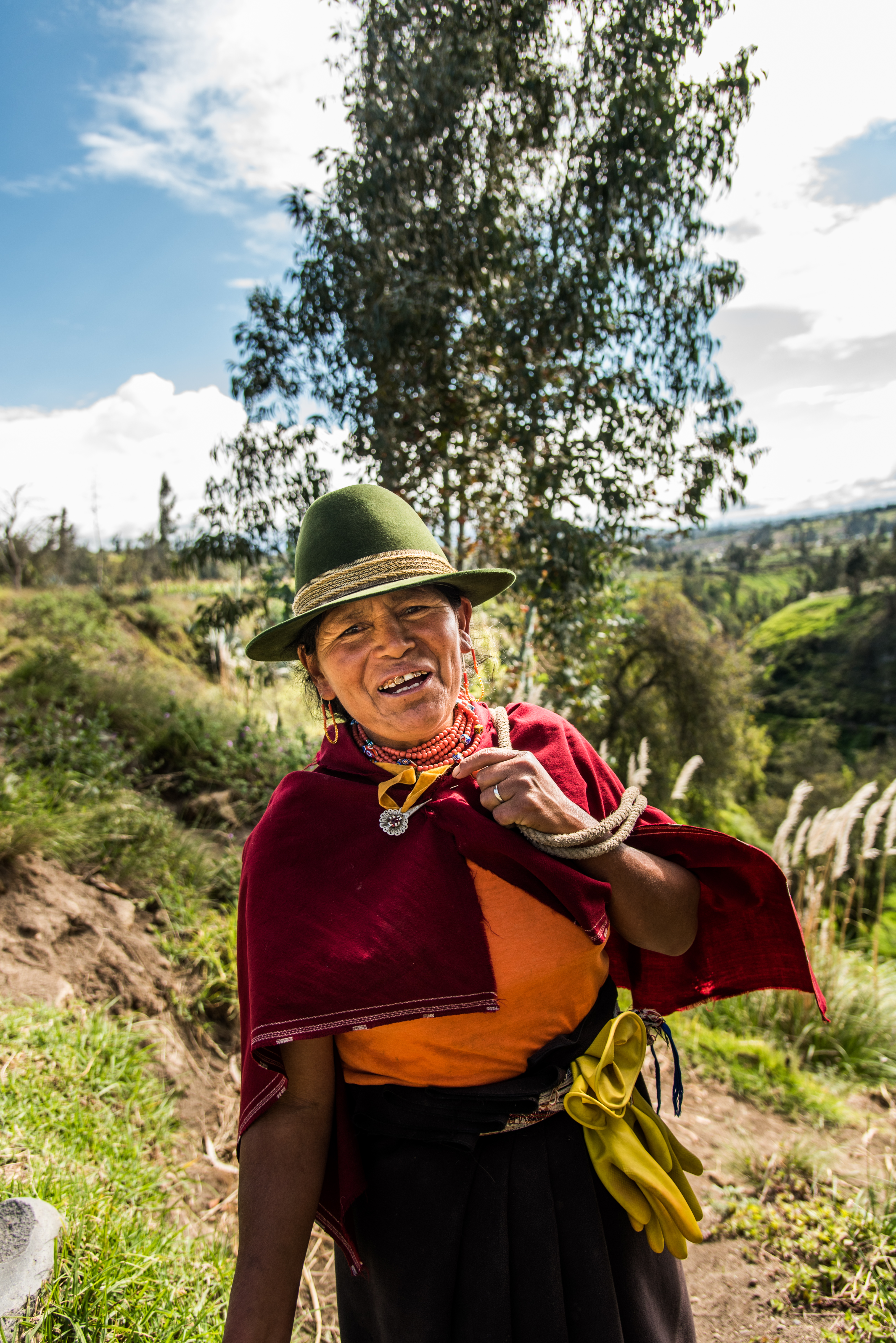 Martina Masaquiza Sailema like other Salasaca women wear traditional outfits and don colorful jewelry.