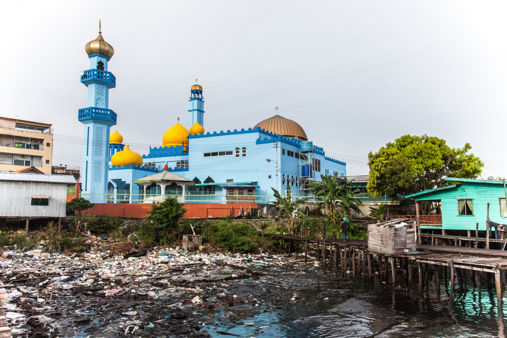 The coast of Semporna is littered with rubbish from the city and the ocean.