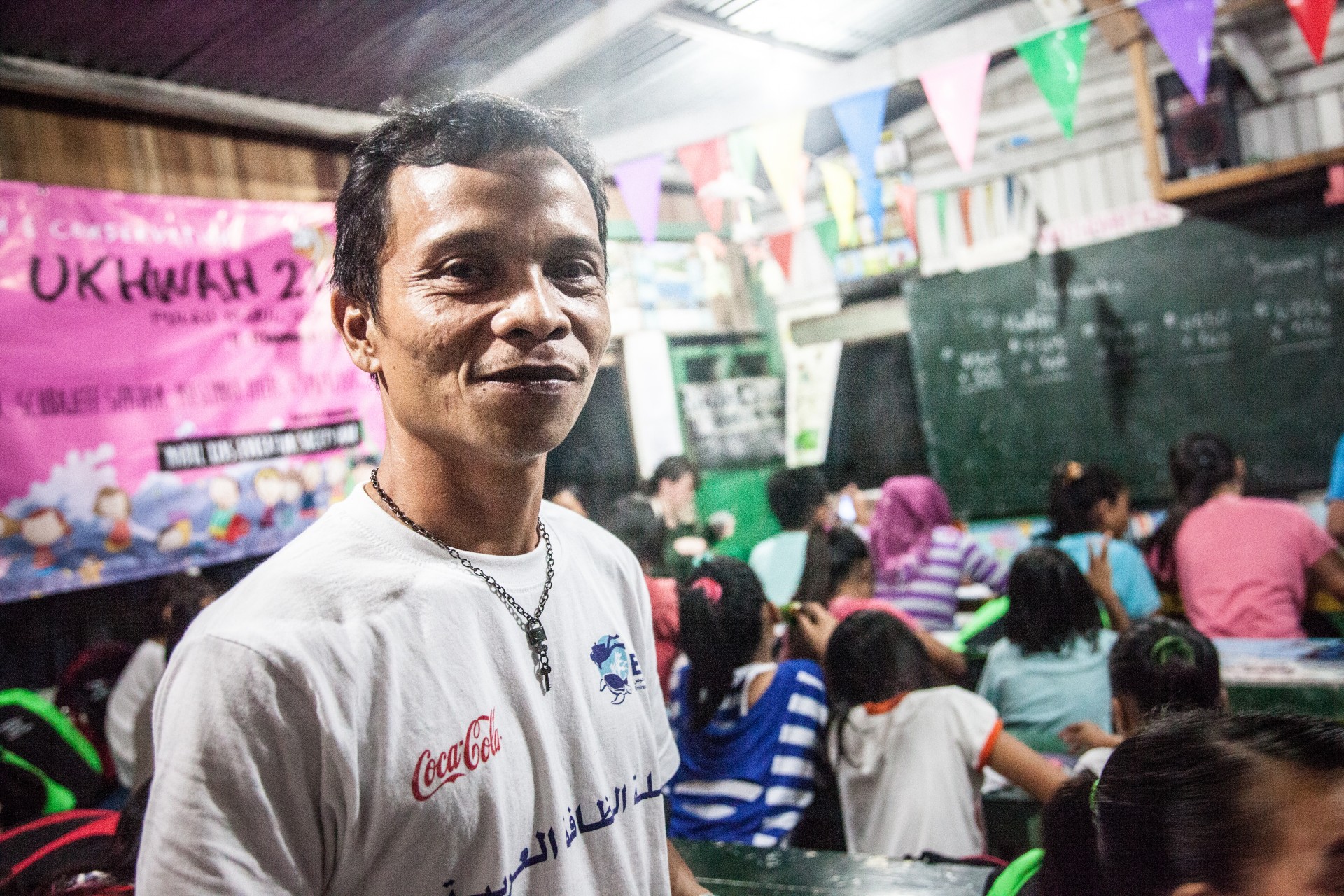 Alee, the only teacher at the school. He started working with Baja Laut’s undocumented children five years ago.