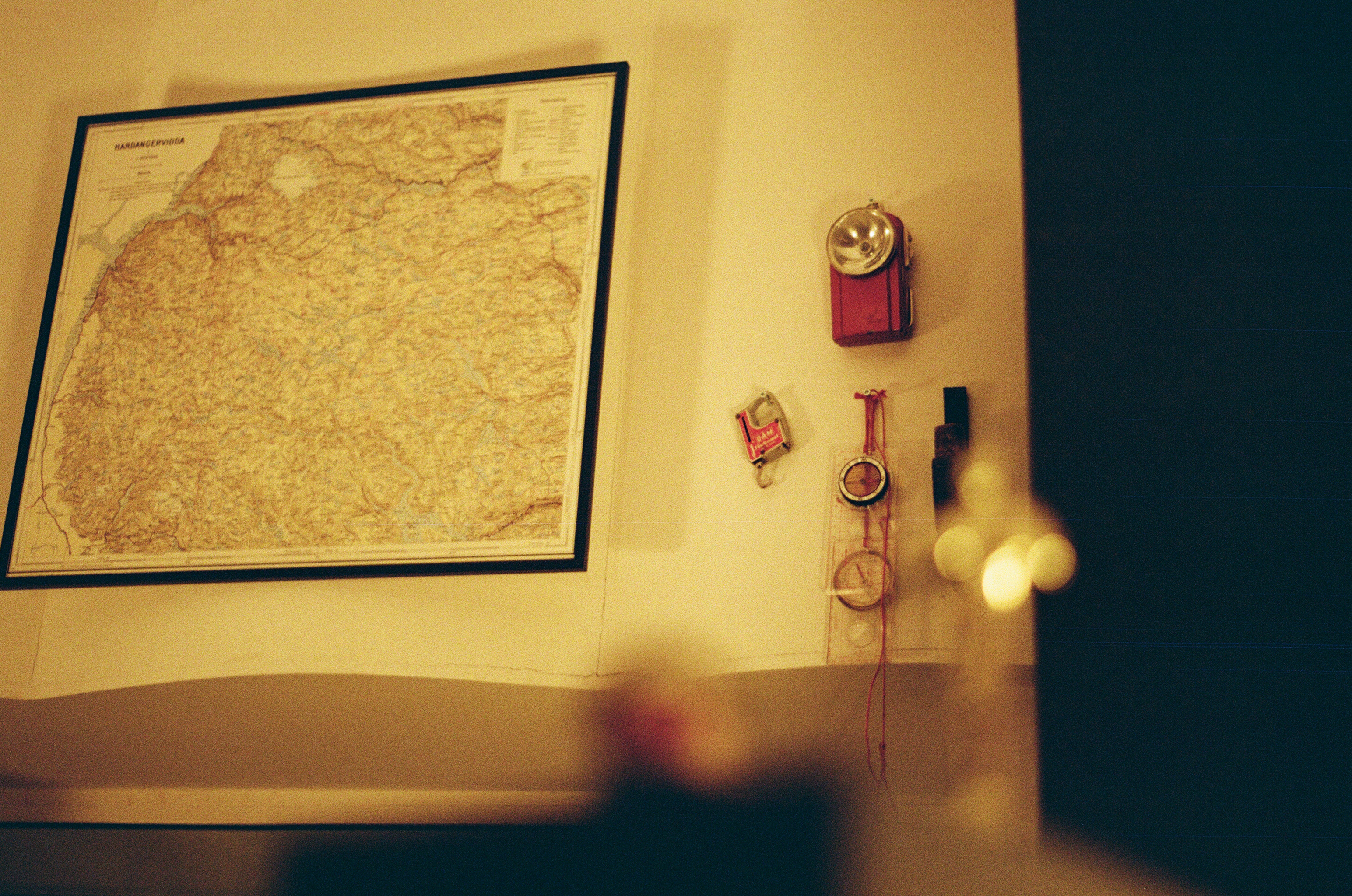 A map of Hardangervidda in Norway hangs on the wall in the recording studio. ©Justė Urbonavičiūtė