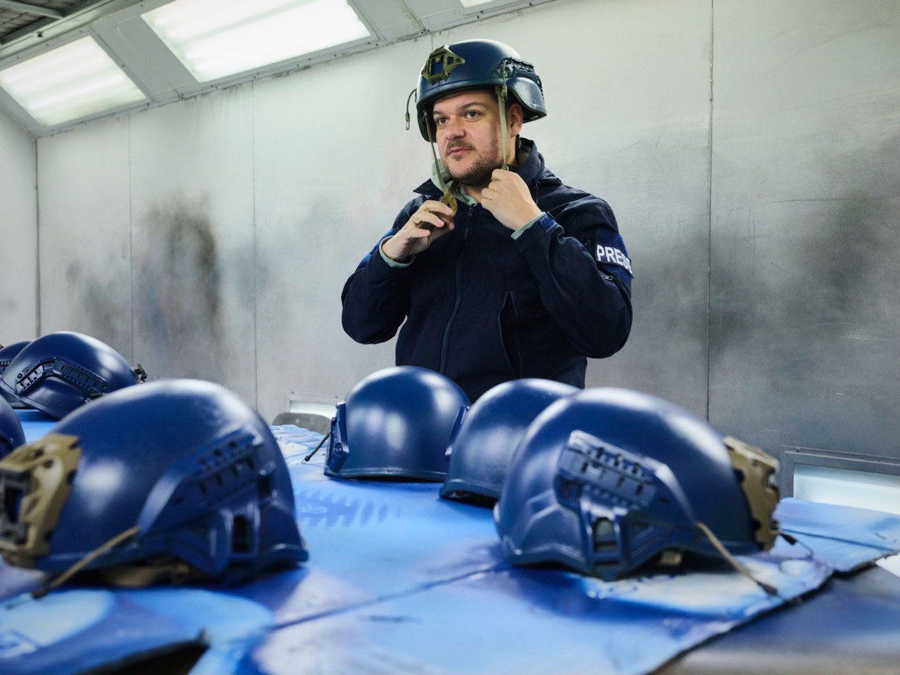 Roman Stepanovych, co-founder and CEO of Zaborona, is testing new helmets for journalists.