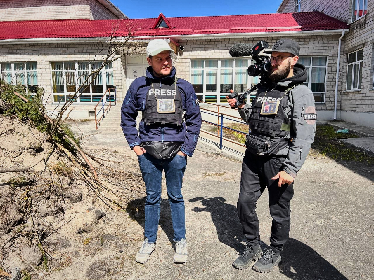 Katerina's colleagues – Roman Stepanovych, co-founder and CEO of Zaborona and video producer, and Mykola Dondyuk, Zaborona videographer – on assignment in Kyiv Oblast, April 2022.