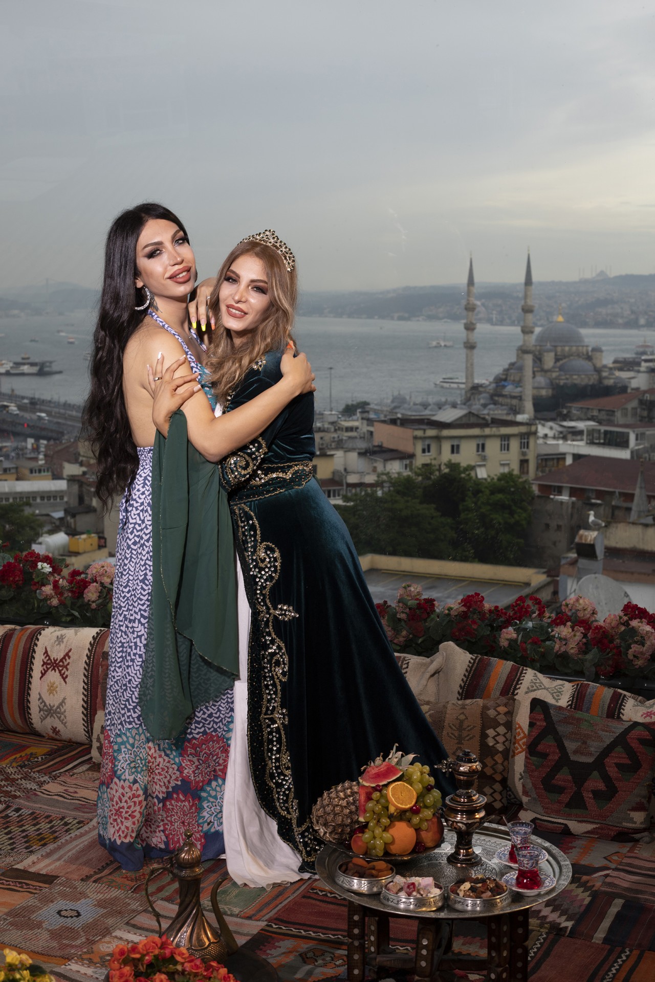 Haleh and her sister take a souvenir photo at a photography studio in Istanbul.