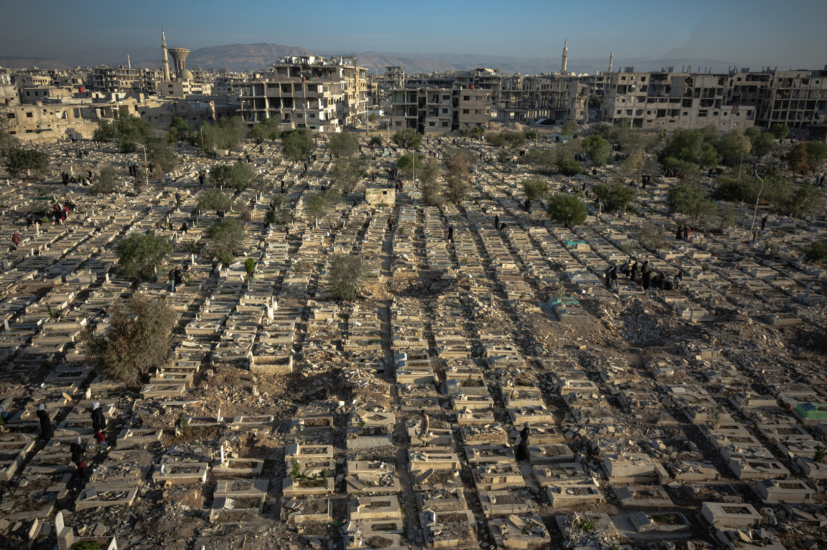 Palestinos diasparos Jarmuke kapinės. Vietos gyventojai renkasi prie artimųjų kapų ankstyvą Eido rytą. ©Denis Vėjas
